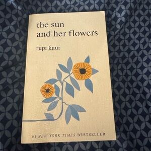 Milk and honey and the sun and her flowers poetry